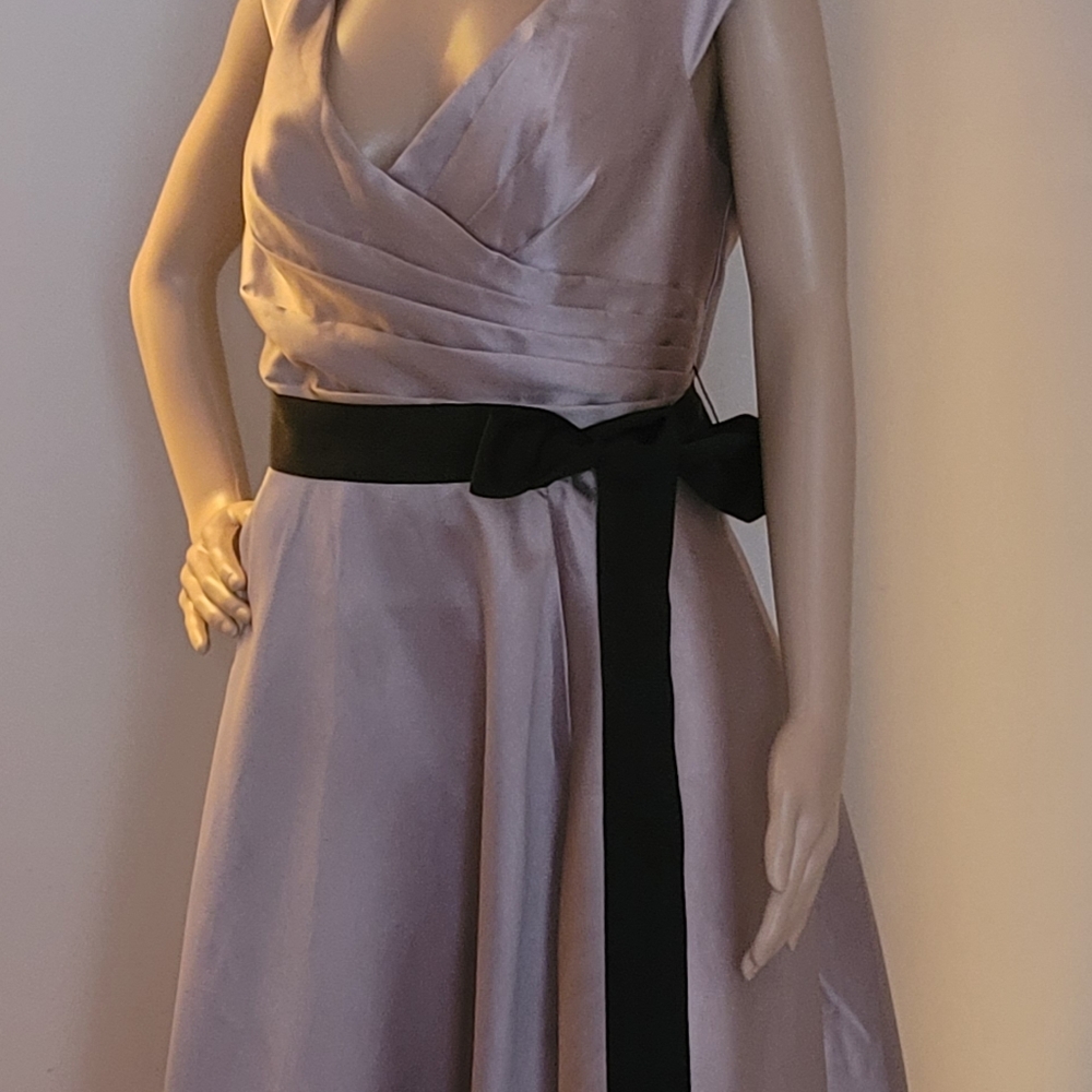 This is a maxi dress from David's bridal the brand is oleg cassini, size 14 grey